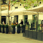 Typical view of the Parisian street with tables of brasserie (ca